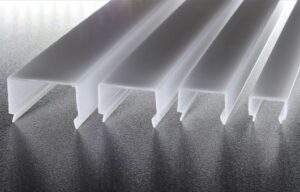 Extrusion of polycarbonate and methacrylate profiles
